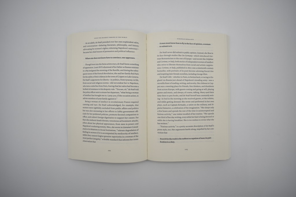 A photograph of a spread of the second edition of James Geary's book, "The World in a Phrase: A Brief History of the Aphorism." The spread, turned to the chapter entitled "European Moralists," shows the book's featured aphorisms set off from text and in bold.